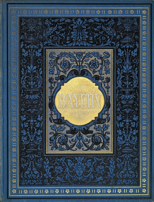 Ein blau-goldenes Buch mit dem Wort 'Bayern' auf einem kunstvoll gestalteten Einband.